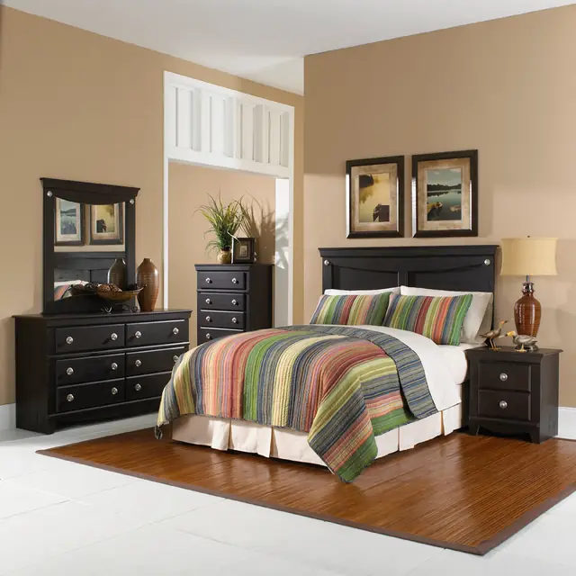 Black bedroom set with headboard, dresser, mirror, chest and nightstand